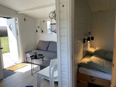 Bjælkehytte med havudsigt 